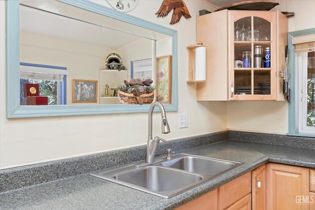 45071 Forest Dr, Posey, CA 93260 - kitchen featuring light brown cabinetry, dark countertops, and glass insert cabinets