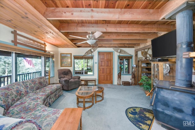 45071 Forest Dr, Posey, CA 93260 - living room featuring a wooden ceiling with exposed beams, carpet floors, a wood stove, and a ceiling fan