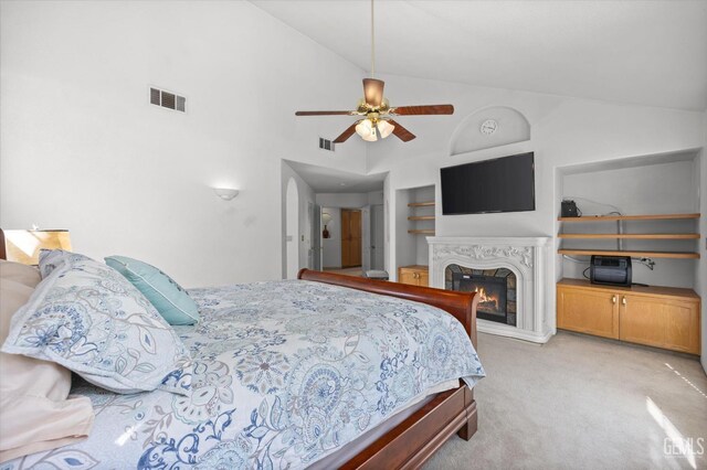 7601 Live Oak Way, Bakersfield, CA 93308 - bedroom featuring light carpet, a premium fireplace, high vaulted ceiling, and a ceiling fan