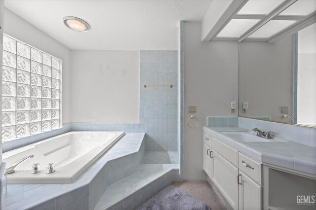 7601 Live Oak Way, Bakersfield, CA 93308 - bathroom with vanity and a bath