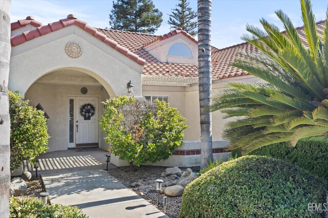 7601 Live Oak Way, Bakersfield, CA 93308 - view of front of property with a tile roof and stucco siding