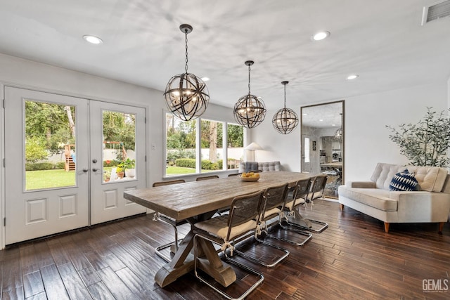 dining room featuring french doors and dark hardwood / wood-style floors