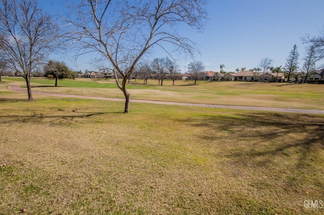 2318 Edingal St, Bakersfield, CA 93311 - surrounding community with a residential view, view of golf course, and a yard