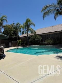 10011 Grand View Summit Dr, Bakersfield, CA 93311 - view of pool with a patio
