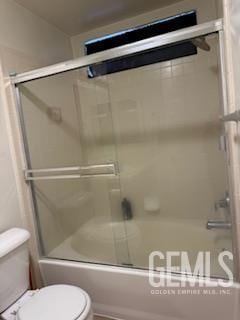 10011 Grand View Summit Dr, Bakersfield, CA 93311 - bathroom featuring toilet and combined bath / shower with glass door