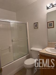 10011 Grand View Summit Dr, Bakersfield, CA 93311 - full bath featuring vanity and shower / bath combination with glass door