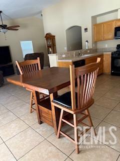 10011 Grand View Summit Dr, Bakersfield, CA 93311 - dining room with light tile patterned floors and ceiling fan