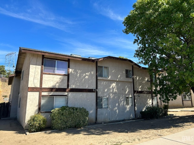 view of property exterior with stucco siding