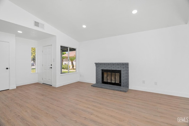 1317 Canyon Ct, Bakersfield, CA 93307 - unfurnished living room with wood finished floors, recessed lighting, lofted ceiling, baseboards, and a fireplace