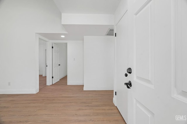 1317 Canyon Ct, Bakersfield, CA 93307 - corridor with baseboards, light wood-style floors, and recessed lighting