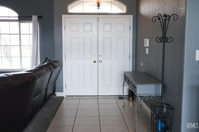 view of tiled foyer entrance