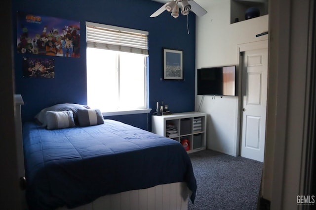 carpeted bedroom featuring a ceiling fan