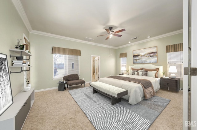 bedroom featuring connected bathroom, light colored carpet, ceiling fan, and ornamental molding