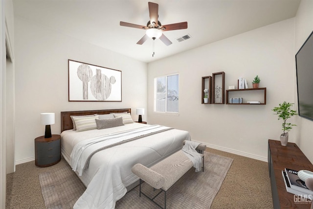 bedroom with dark carpet and ceiling fan