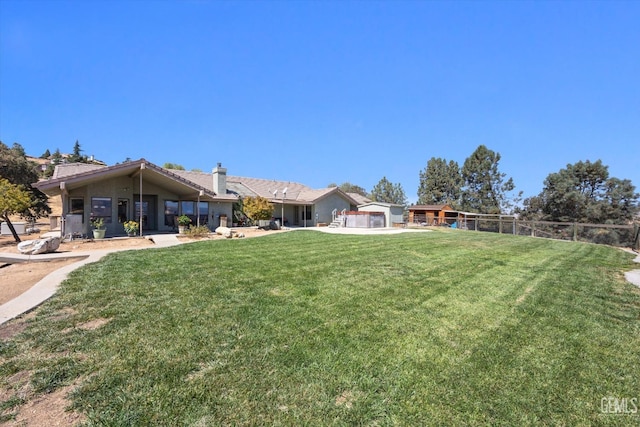 view of yard with a garage