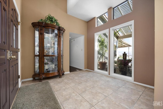 entryway featuring light tile patterned flooring