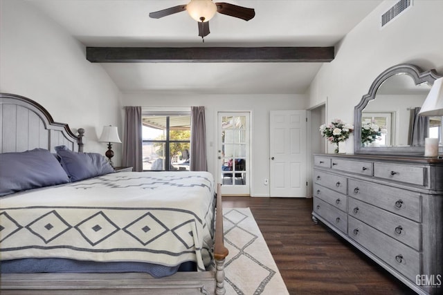 bedroom with vaulted ceiling with beams, ceiling fan, and dark wood-type flooring