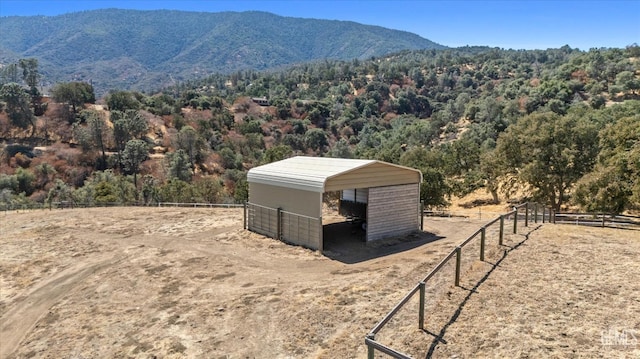 property view of mountains featuring a rural view