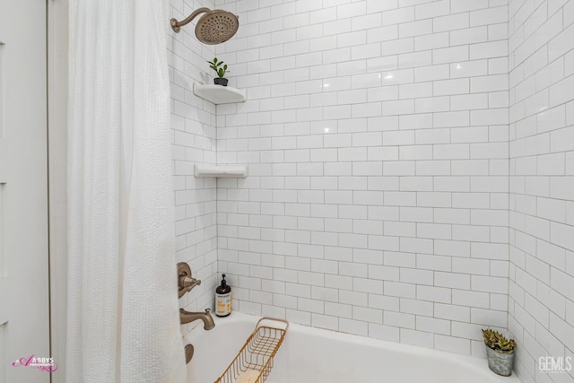 bathroom featuring shower / bath combination with curtain