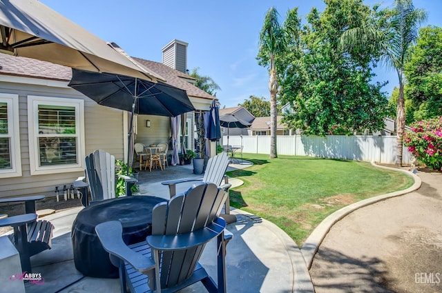 view of patio / terrace with outdoor dining area and fence