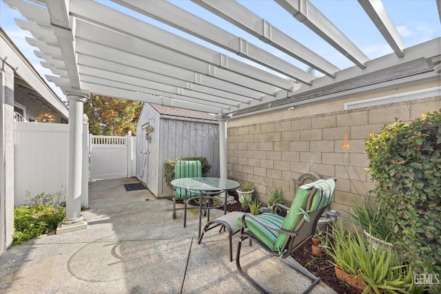 501 Reed St, Bakersfield, CA 93314 - fenced backyard with a patio area, outdoor dining space, and a pergola