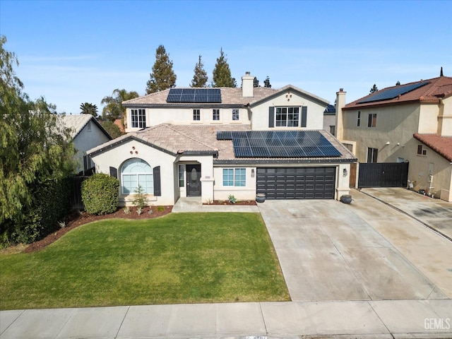 view of front of property featuring a front yard and solar panels