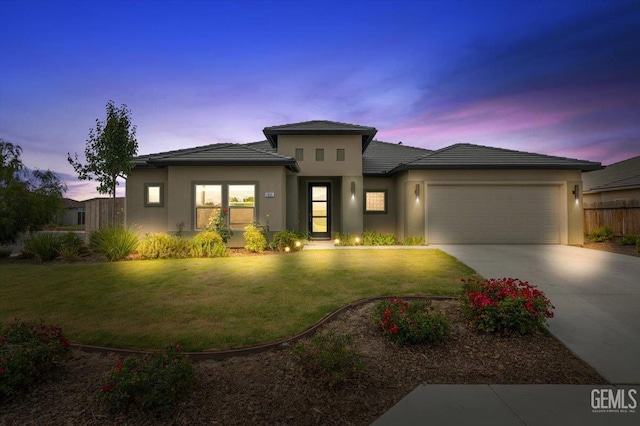 11001 Arundel Way, Bakersfield, CA 93311 - prairie-style home with a garage, stucco siding, concrete driveway, and a tiled roof