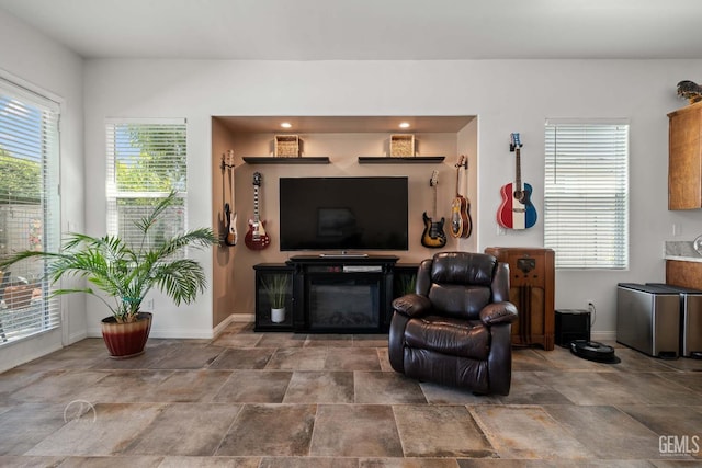 6315 Veronese Ct, Bakersfield, CA 93306 - living room with baseboards and stone finish floors