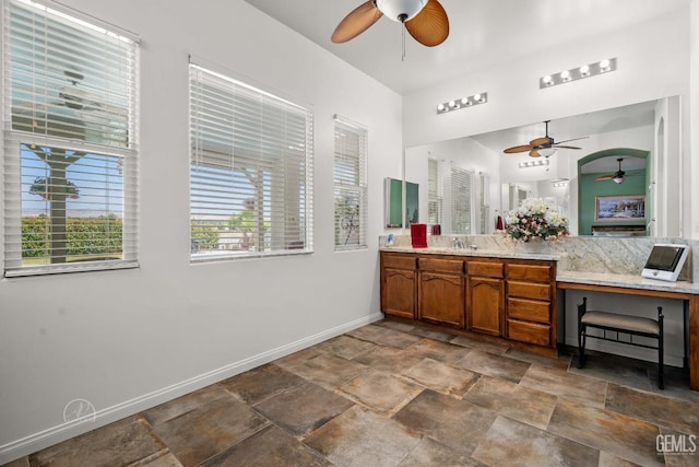 6315 Veronese Ct, Bakersfield, CA 93306 - full bath featuring a ceiling fan, vanity, and stone finish floors