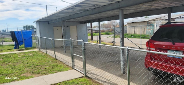 exterior space featuring a gate and fence