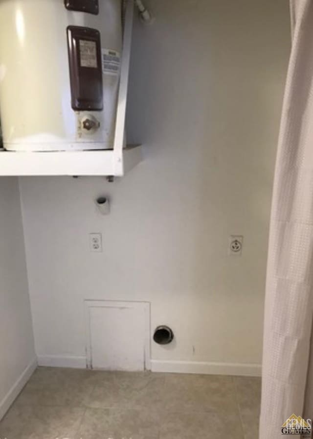 2912 Lum Ave, Bakersfield, CA 93304 - washroom with water heater and baseboards