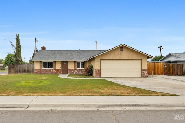 ranch-style home featuring fence, driveway, a front yard, and a garage