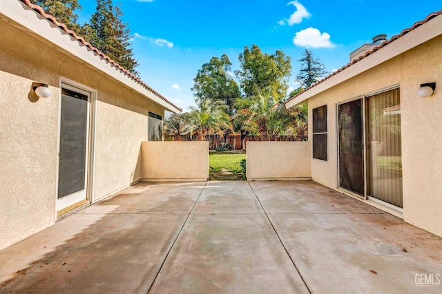 view of patio / terrace with fence