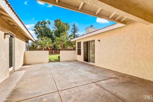 view of patio with fence