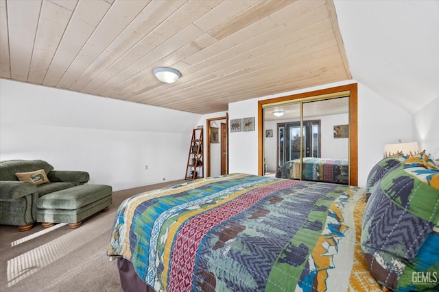 carpeted bedroom with a closet, lofted ceiling, and wood ceiling