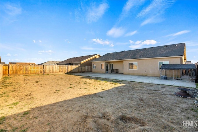 rear view of property with a patio