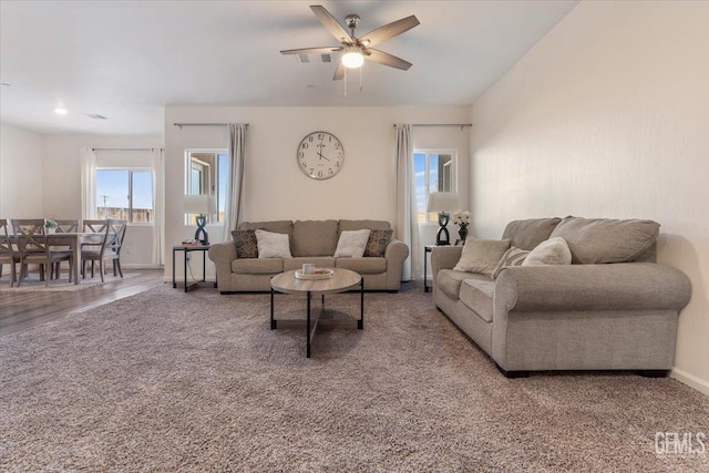 living room featuring ceiling fan