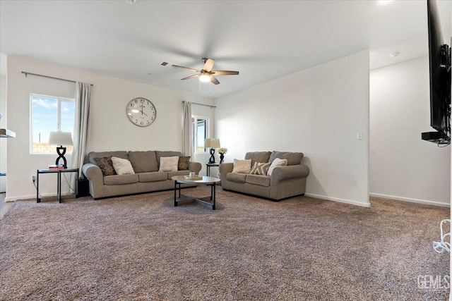 carpeted living room featuring ceiling fan