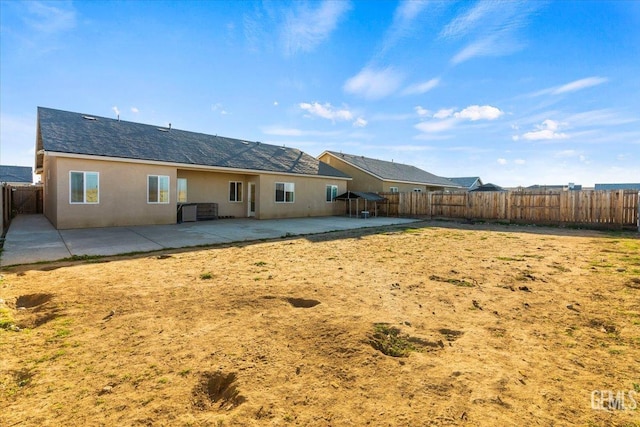 rear view of house with a patio