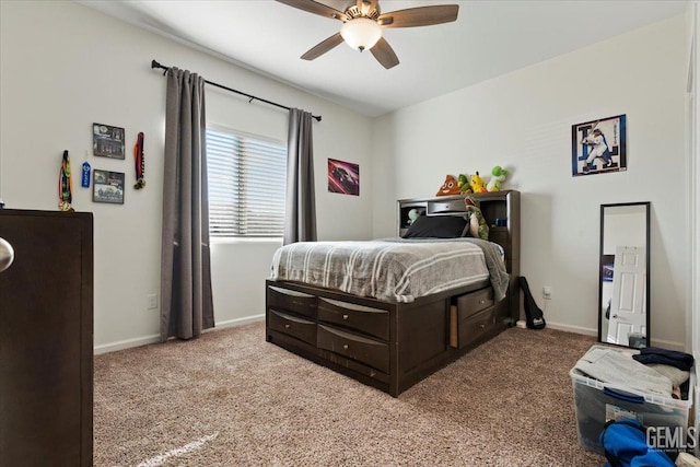 bedroom featuring ceiling fan and carpet floors