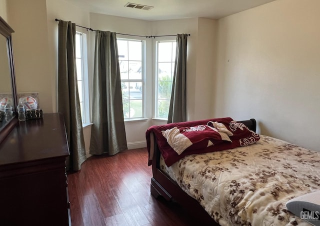 1941 Vassar St, Delano, CA 93215 - bedroom with dark wood-style flooring and baseboards