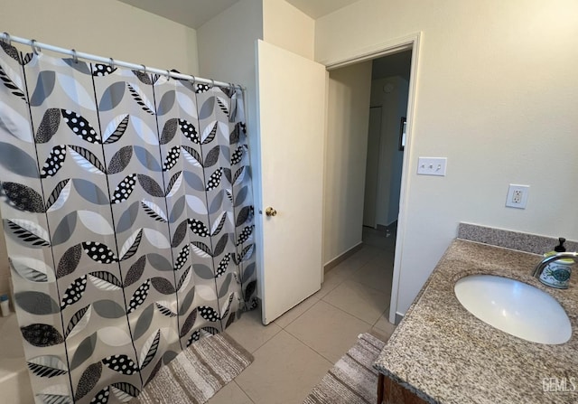 1941 Vassar St, Delano, CA 93215 - full bathroom featuring a shower with curtain, vanity, and tile patterned flooring