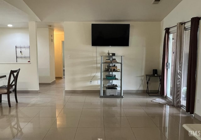 1941 Vassar St, Delano, CA 93215 - living area featuring baseboards and recessed lighting