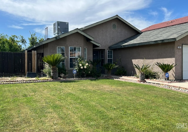 1941 Vassar St, Delano, CA 93215 - ranch-style home with stucco siding, a garage, and cooling unit