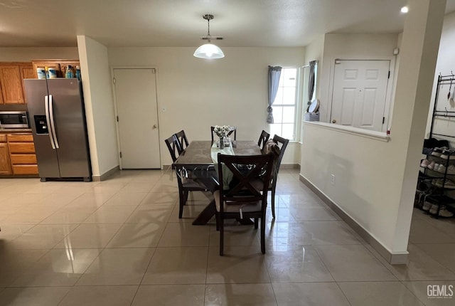 1941 Vassar St, Delano, CA 93215 - dining room with light tile patterned floors and baseboards
