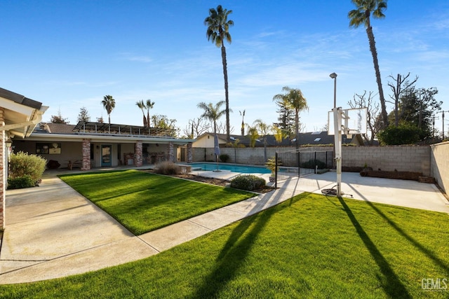 view of pool featuring a fenced in pool, a fenced backyard, and a lawn