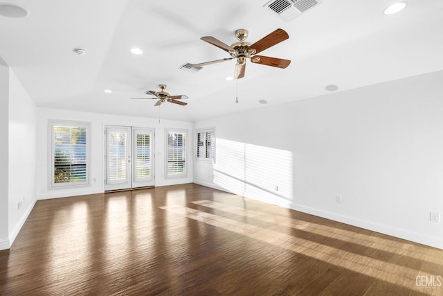 unfurnished living room featuring recessed lighting, visible vents, dark wood finished floors, and baseboards