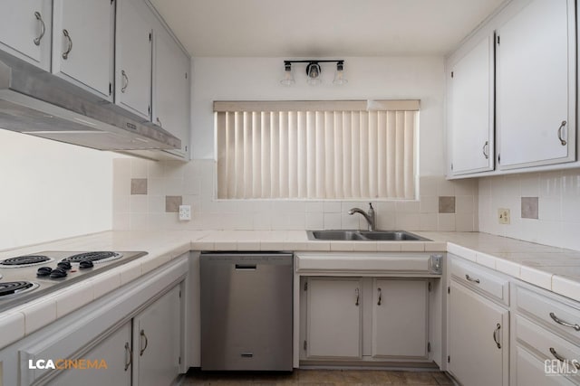 kitchen featuring dishwasher, white gas cooktop, white cabinets, sink, and tile counters