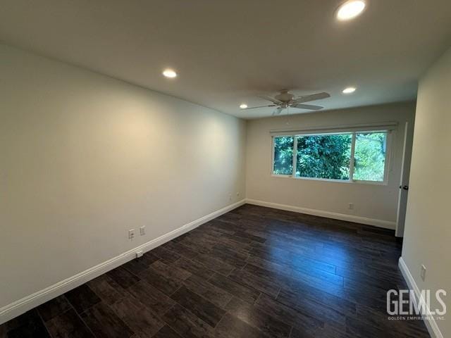 7009 Quailwood Dr, Bakersfield, CA 93309 - spare room with ceiling fan, recessed lighting, and dark wood finished floors