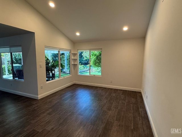 7009 Quailwood Dr, Bakersfield, CA 93309 - unfurnished room featuring dark wood-style flooring, recessed lighting, and high vaulted ceiling